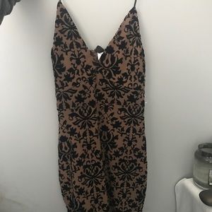 Black and nude mid length dress